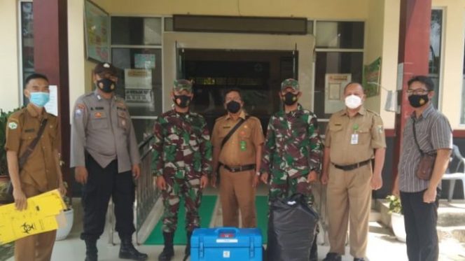 
					Hari Kedua, Polres Tanggamus dan TNI Kawal Distribusi Vaksin ke 13 Puskesmas