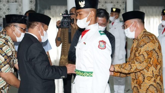 
					Plt Wali Kota Tanjungbalai Kukuhkan 20 Anggota Paskibra 202