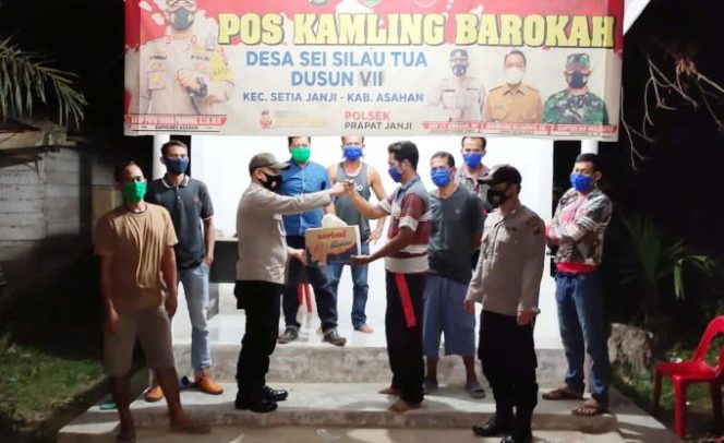 
					Ciptakan Situasi Kamtibmas yang Kondusif di Malam Hari, Personil Polres Asahan Patroli Pos Kamling Barokah