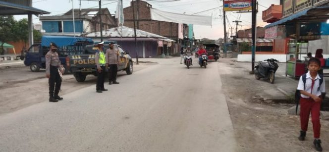 
					Patroli Pasar lmpres Tanjung Tiram, Antisipasi Kemacetan Di Wilayah Hukum Polsek Labuhan Ruku