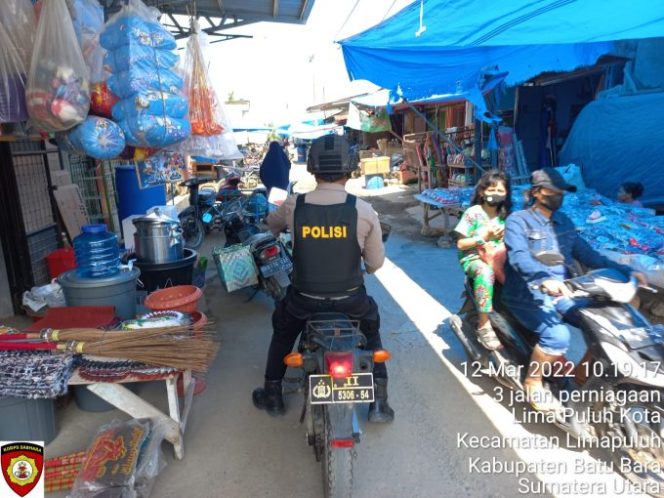 
					Tim Patroli R2 Polres Batu Bara Himbau Prokes di Pajak Lima Puluh