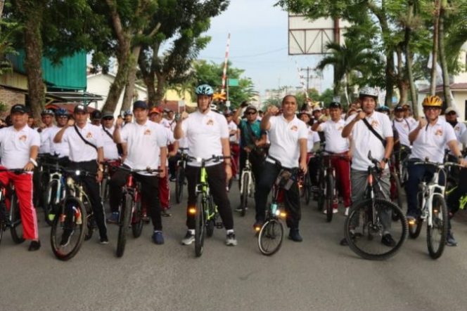 
					Semarak HUT Bhayangkara ke 76, Polres Asahan Selenggarakan Fun Bike dan Baksos