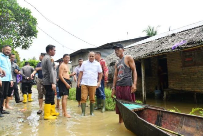 
					Ratusan Rumah Warga Terendam Banjir ! AKBP Jose Tinjau Titik Tanggap Darurat