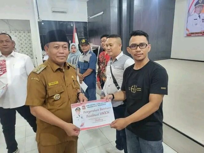 
					Dinkop UKM Tanjungbalai Memberikan Bantuan Peralatan Pada Pelaku UKM