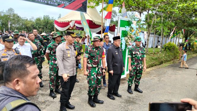 
					Momen Kapolres Endro Hadiri TMMD 120 Kodim 0404 / Muara Enim