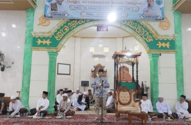 
					Hadiri Haul Ulama dan Peringatan Isra Mi’raj Nabi Muhammad SAW, Bupati Anwar Sadat Serukan Peningkatan Keimanan dan Kepedulian Sosial