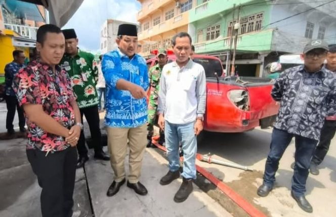 
					Wujudkan Kota Kuala Tungkal Bebas Genangan, Bupati Anwar Sadat Pantau Pembersihan Drainase